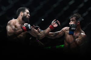 Two men face off against each other in a bare-knuckle fight