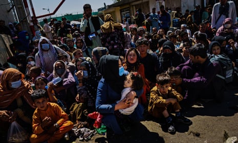 Bedlam at a Taliban-controlled checkpoint on 25 August 2021 as crowds wait to make their way towards the British-controlled entrance of Kabul airport. 