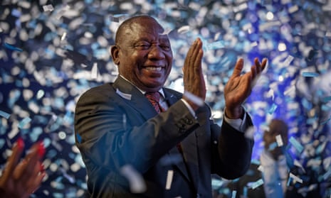 Cyril Ramaphosa applauds as confetti is launched at the end of the results ceremony in Pretoria.