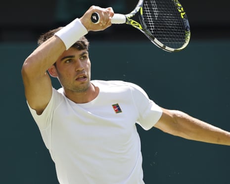 Wimbledon 2025 Live Updates: Your Comprehensive Guide to Schedule, Prize Money & Player Results 8 Carlos Alcaraz playing tennis at Wimbledon