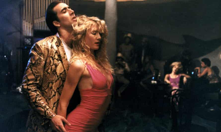 With Laura Dern in Wild at Heart, 1990.