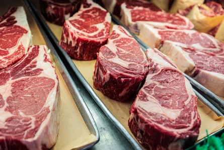 close-up of large cuts of steak at a butcher shop in NYC