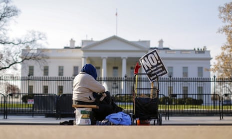 A lone protester in front of the White House in Washington DC Monday.