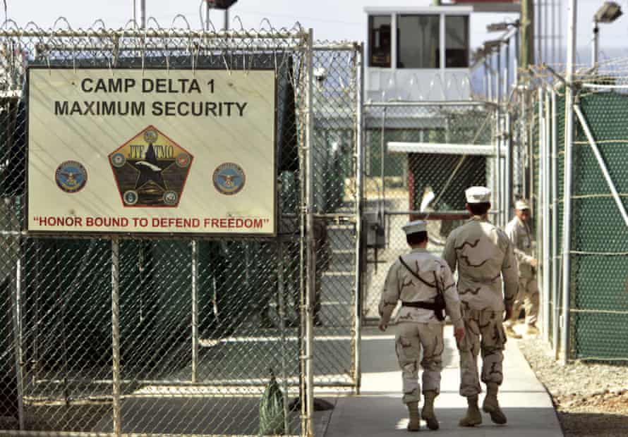2006 file photo: US military guards walk within Camp Delta military-run prison, at the Guantanamo Bay US Naval Base, Cuba.