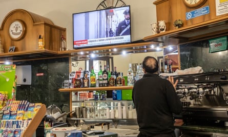 A bartender watches news of the arrest in the mafia boss’s hometown of Castelvetrano