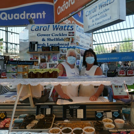 Carol Watts (left) and sister Jo at her stall in Swansea Market.