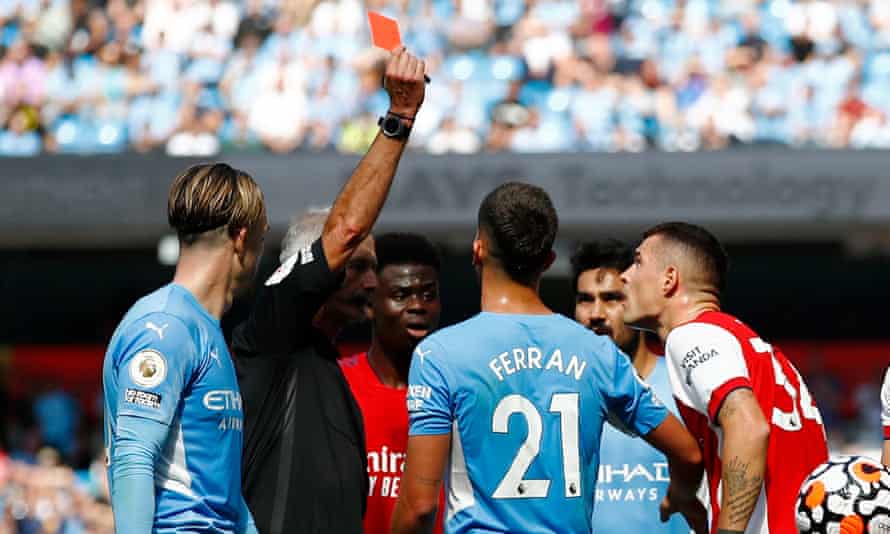 Wretched 10-man Arsenal left in tatters by strikerless Manchester City |  Premier League | The Guardian