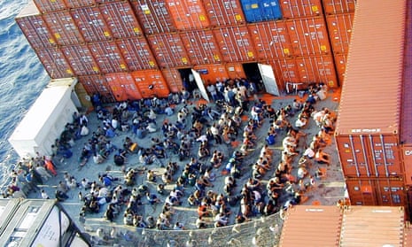 The 433 rescued asylum seekers onboard the Norwegian cargo ship MV Tampa on 27 August 2001 as it sat anchored off Christmas Island.