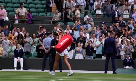Belarusian Victoria Azarenka leaves the court after losing to Ukrainian Elina Svitolina at Wimbledon