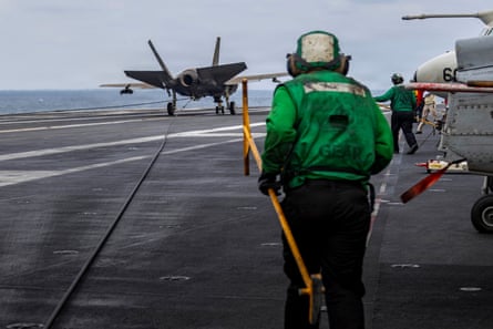 USS Abraham Lincoln crew conducting flight operations in the Arabian Sea