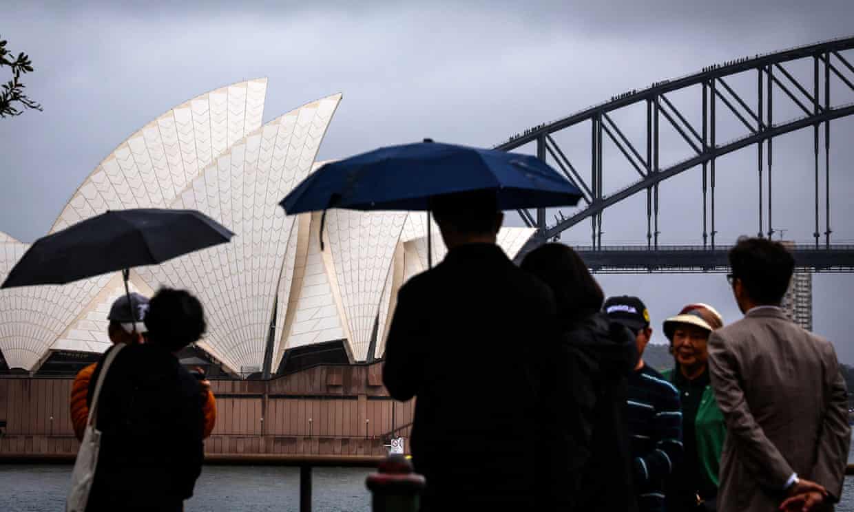 Christmas revellers have been encouraged to prepare indoor plans for festivities as storms and showers are forecast for much of the east coast. Photograph: David Gray/AFP/Getty Images