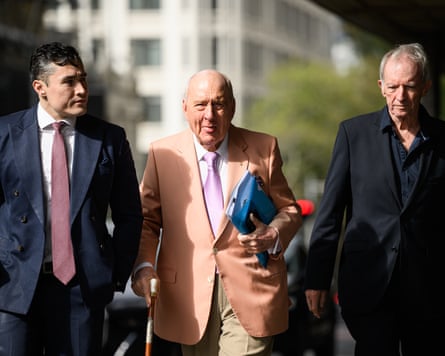 Alan Jones (centre) arrives at court on Tuesday. Alan Jones (centre) arrives at court on Tuesday.