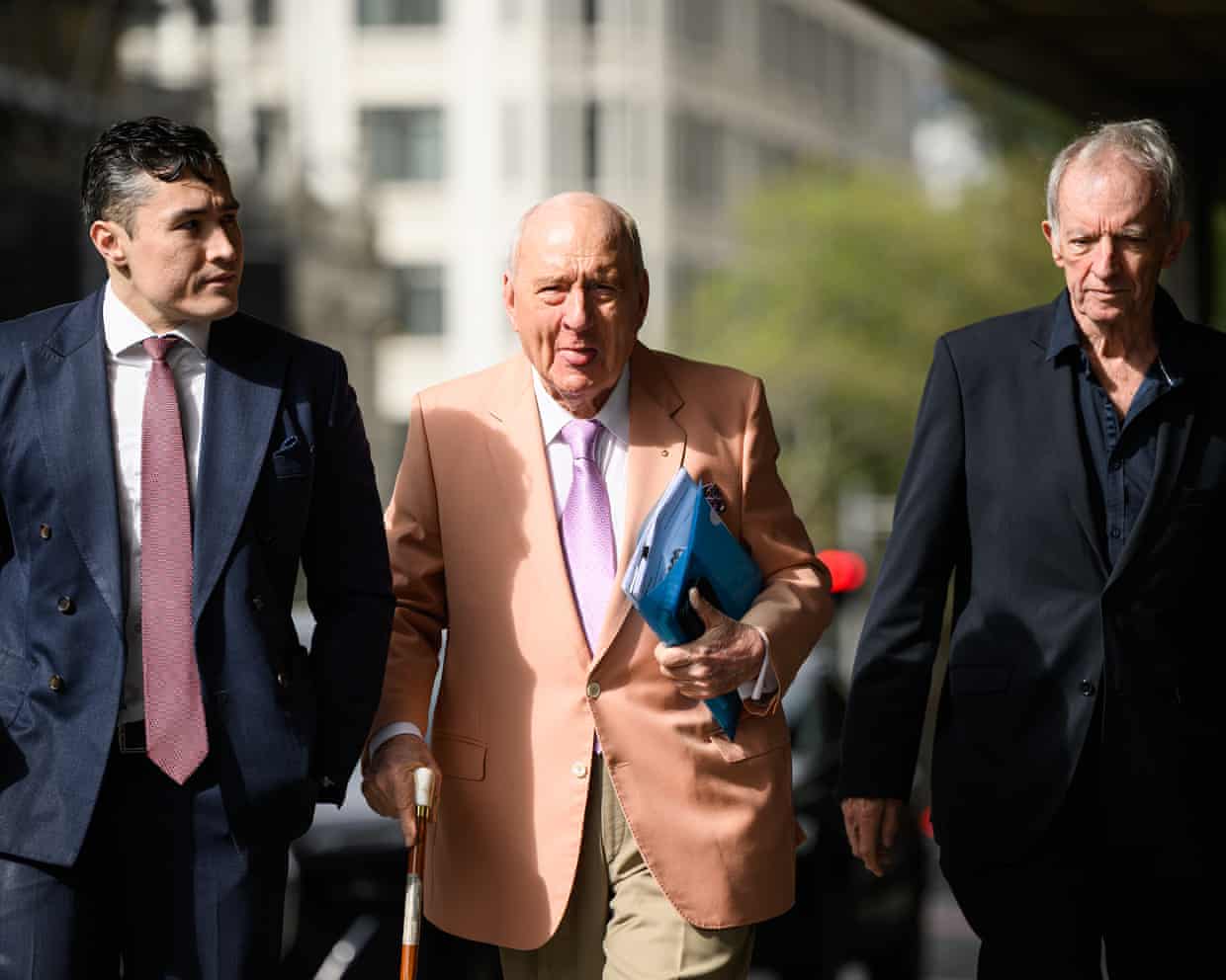 Alan Jones (centre) arrives at court on Tuesday.