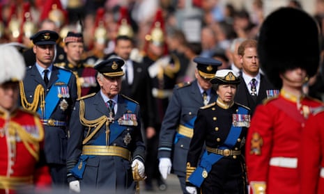 Prince William, King Charles, Princess Anne and Prince Harry following the coffin of Queen Elizabeth II.