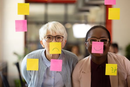 Portrait of a diverse group of coworkers in their office, enjoying their workPortrait of a senior woman of Caucasian ethnicity and her young African American female coworker, a happy diverse group of business people at work, enjoying their work together, mixing work with the pleasure and having fun