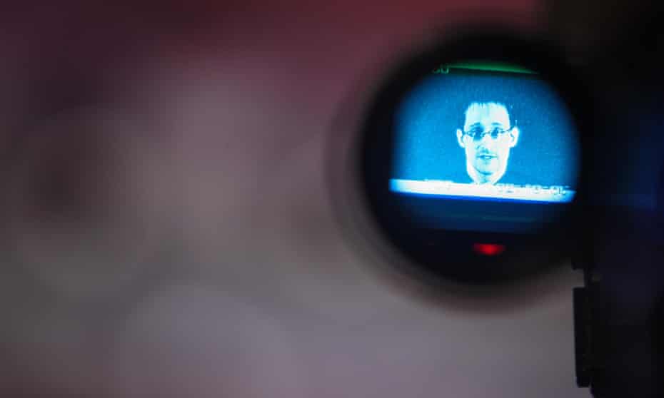 Edward Snowden is seen on the display of a camera during a live remote interview at CeBIT 2015.