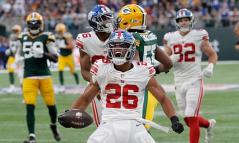 Saquon Barkley, the Giants running-back, celebrates during the NFL London match between New York Giants and Green Bay Packers at the Tottenham Hotspur Stadium.