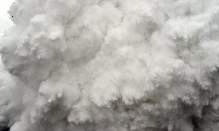 A cloud of snow and debris triggered by an earthquake flies towards Everest base camp.