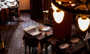 Interior of the dark-wood-design restaurant Parrilla Don Julio, Buenos Aires, Argentina.