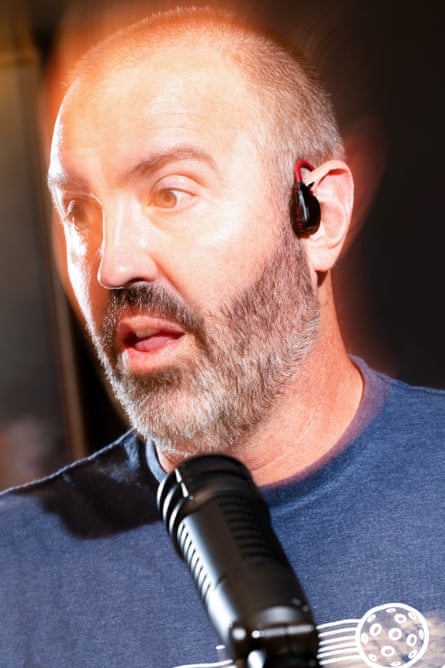Man speaks into a microphone