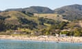 USA, California, Avila Beach. Coastal mountains backdrop for warm spring day beach goers.<br>J2G8YK USA, California, Avila Beach. Coastal mountains backdrop for warm spring day beach goers.