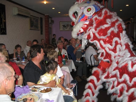 Lion dancer in restaurant