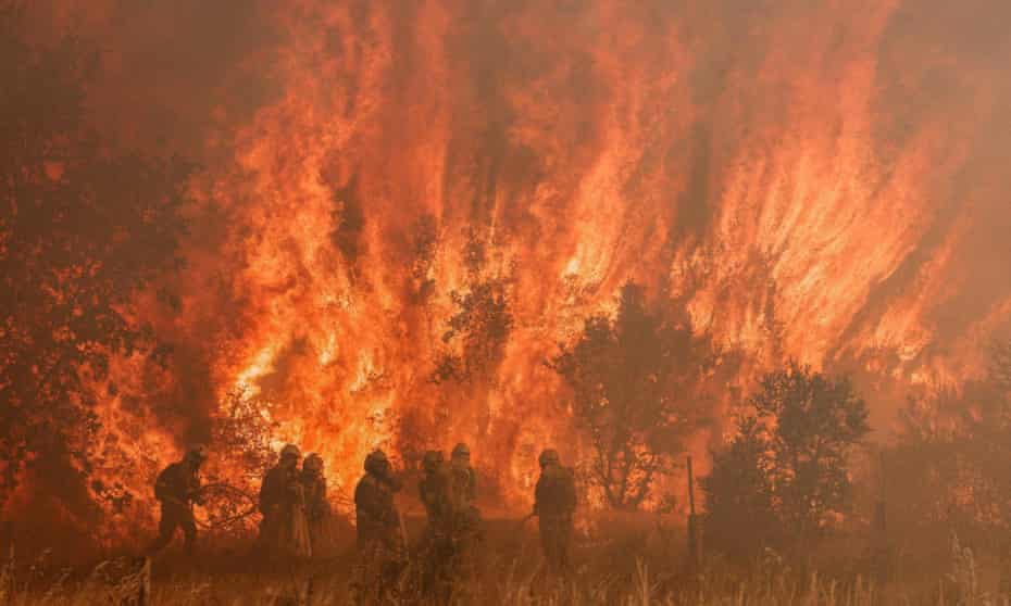 Firefighters facing fire