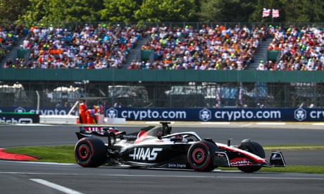 Spectators seen in the background during practice on Friday for the British Grand Prix