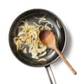 Onions frying in a pan