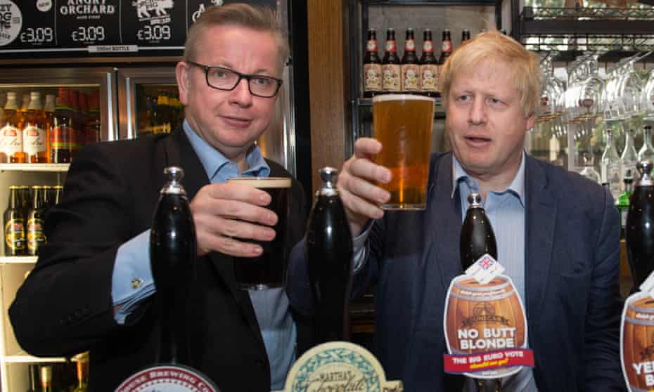 Boris Johnson, right, and Michael Gove pull pints in a pub during the 2016 Vote Leave campaign.