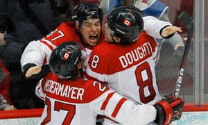 Canada celebrate winning ice hockey gold at the 2010 Winter Olympics