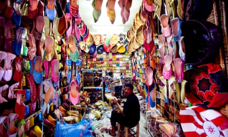 A shoe seller in the souk of Marrakech.