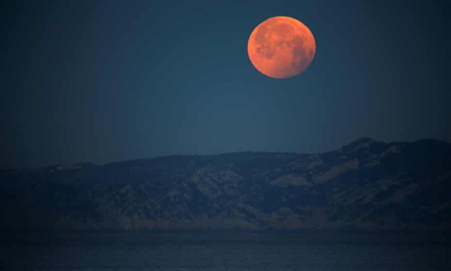 A ‘super blood wolf moon’ during a total lunar eclipse in Marseille, France, in January 2019. The May 2021 full supermoon will be seen on Wednesday from Australia to the US west coast.