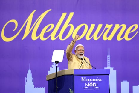 Modi speaks on stage during an event at Docklands Stadium in Melbourne