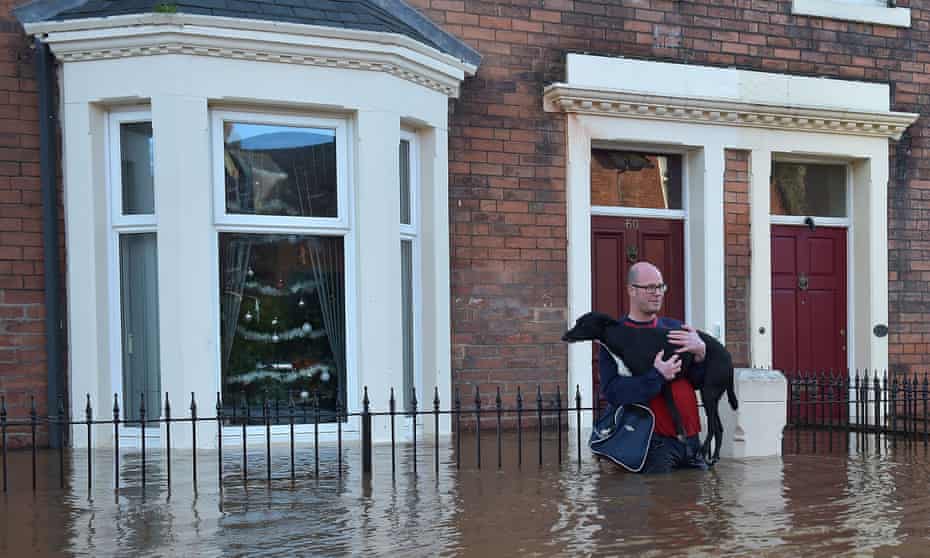 Residents leave flooded homes