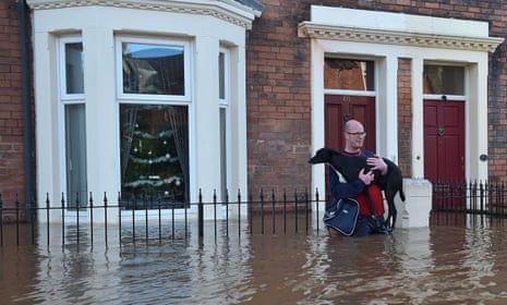 David Nicholson leaves his girlfriend's flooded home