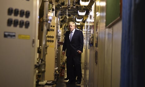 Boris Johnson tours the nuclear submarine HMS Victorious at the Naval Base in Faslane.