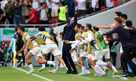 Carlos Queiroz and his players celebrate Rouzbeh Cheshmi’s goal against Wales