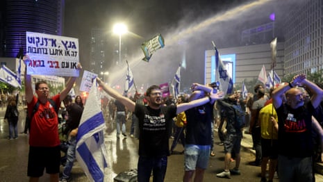 Israeli police use water cannon to disperse protesters in Tel Aviv – video