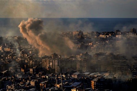 Plumes of smoke from Israeli air raids rise from the southern suburbs of Beirut, a bastion for pro-Iranian Hezbollah.