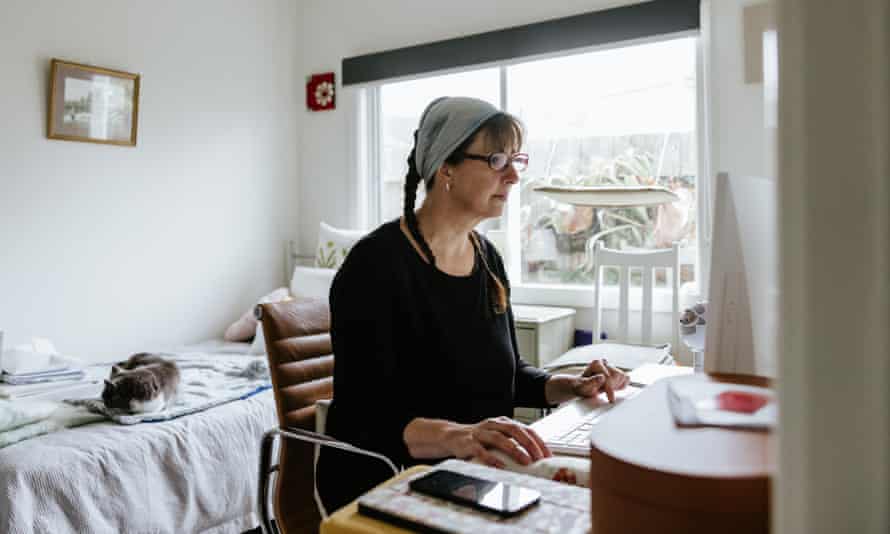 Claire Simpson sitting at her desk, working from her home in Melbourne