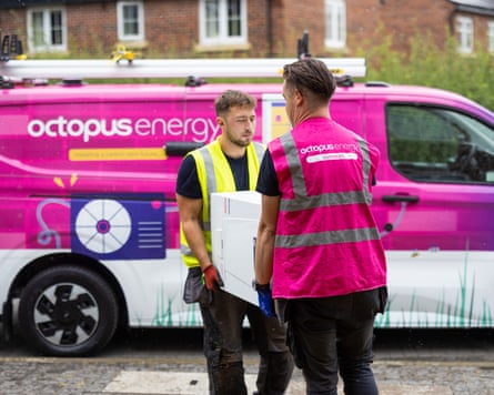Octopus energy staff deliver a heat pump