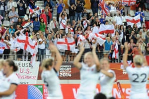 The England supporters in Paris celebrate their team’s victory during the 2014 Women’s Rugby World Cup.
