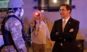 US Defense Secretary Mark Esper visits DC National Guard military officers guarding the White House on Monday.