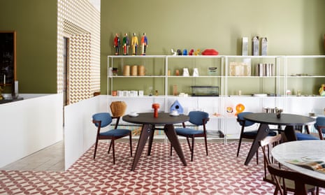 The kitchen-diner, with a mid-century table and Kai Kristiansen chairs.
