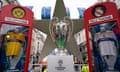 The Champions League trophy is displayed at a fan zone in Regent Street, London.