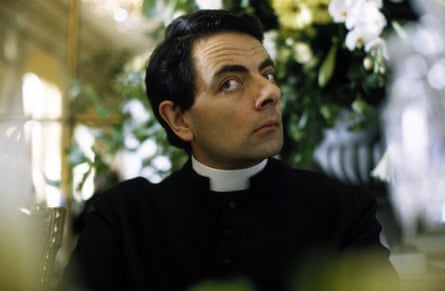 Rowan Atkinson as Father Gerald.