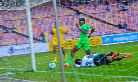 Rasheedat Ajibade scores the second of her two goals in the 4-0 win over Ethiopia.