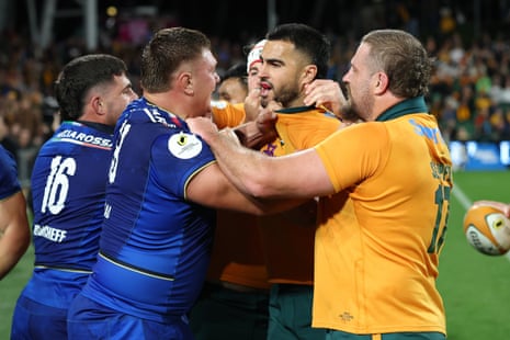 Ion Neculai and Tom Wright lock horns during the Nations Championship match between the Wallabies and Italy