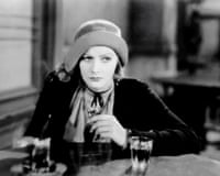 Greta Garbo takes a drink
